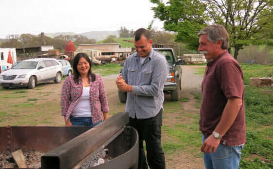 Jennifer Ko and Alex Saneski with their dairy farmer landlord, John Taverna