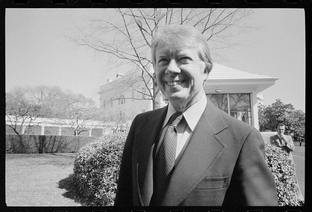 President Jimmy Carter at the White House. During his inauguration, Carter's family business was paid tribute in the form of a peanut float, ca. 1977.